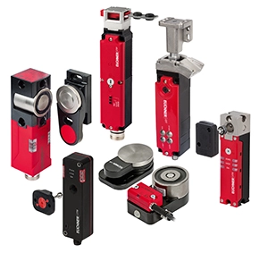 Transponder-coded safety switches with guard locking